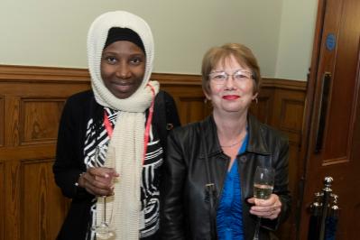 Two ladies smiling